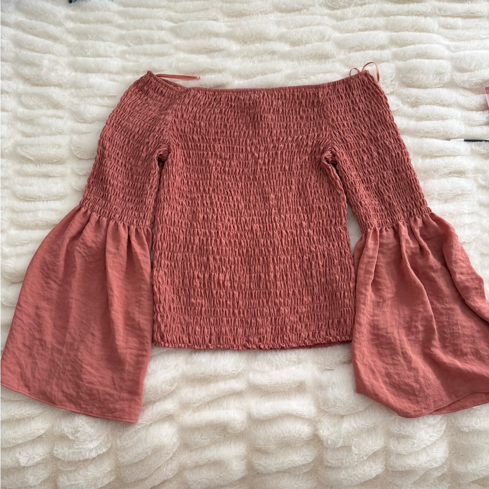 Express tight arm flow top